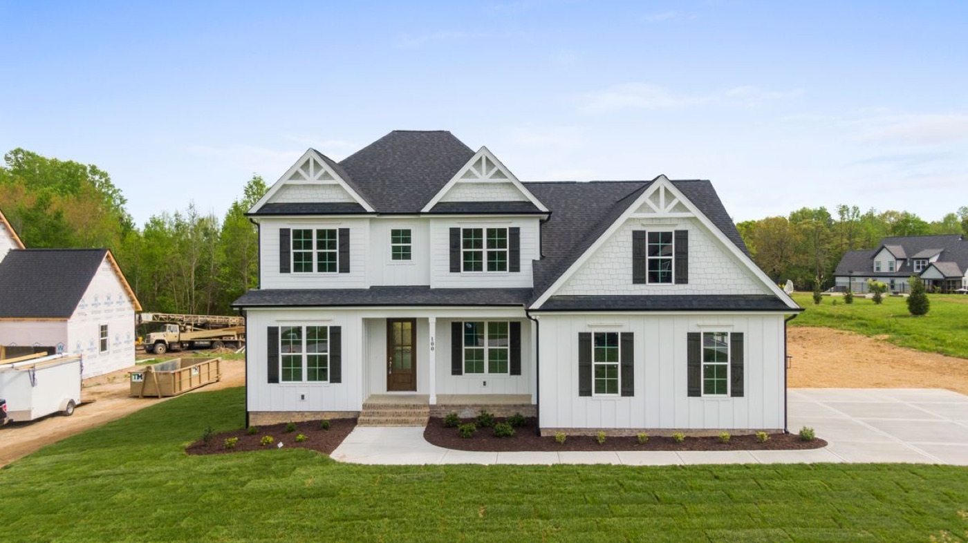 White modern farmhouse style home, newly built